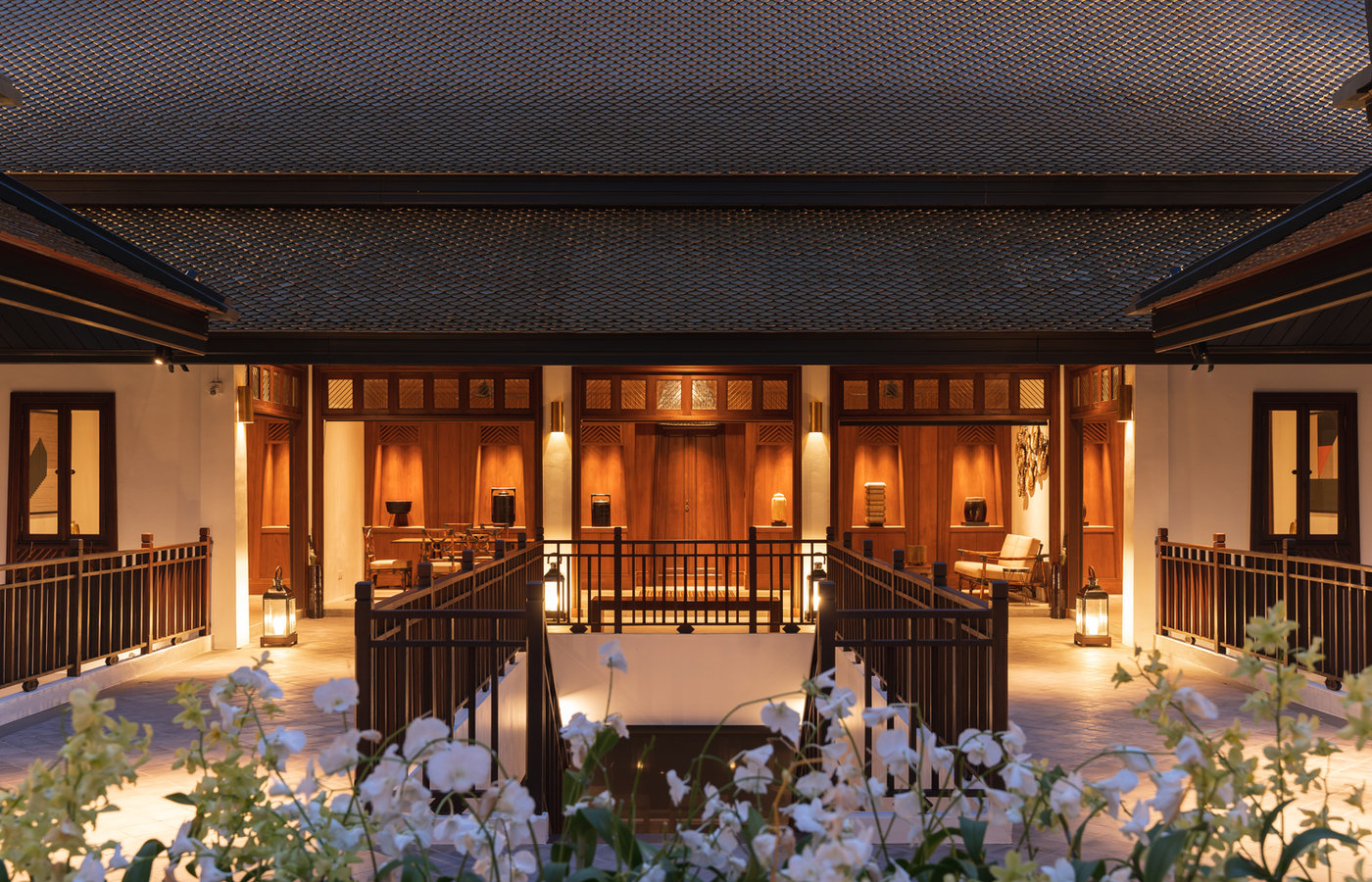 The Siri Sala courtyard at dusk with lanterns lit